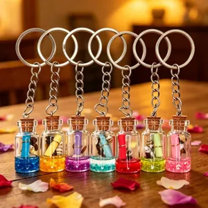 Ocean theme glass drift bottle keychain with cute mini shells, colorful sand and metal rings.