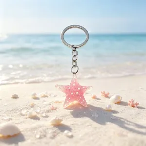 Shiny resin starfish keychain pendant detail shot, cute beach style bag decoration gift for women.