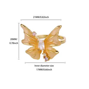 Detailed measurement view of a yellow enamel butterfly ring with zircon accents