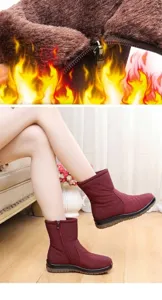 Detail of waterproof winter snow boots with warm plush lining and zipper
