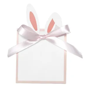 Elegante kreative Kaninchenohr-Geschenktüte mit rosa Schleife für Oster-Süßigkeitenverpackung