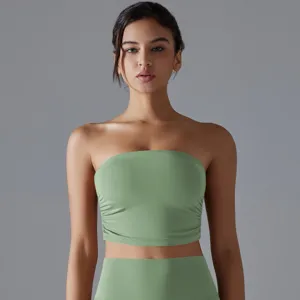 Front view of sage green ruched yoga tube top on a model, detail of breathable slim fit