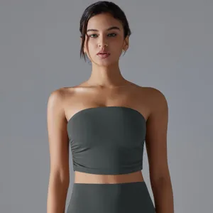 Professional close-up of dark grey pleated tube top yoga sports bra for fitness and gym