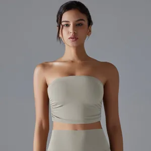 Close-up of sage green ruched yoga tube top with seamless breathable design