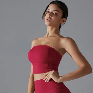 Macro view of red ruched strapless yoga tube top showing breathable slim fit texture