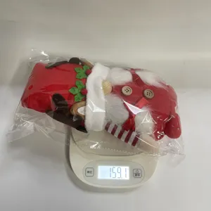 Medición detallada del peso que muestra 159,1 g para el gnomo de peluche decorativo de Navidad