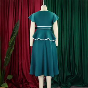 Elegant back view of a green peplum midi dress with white piping on a mannequin