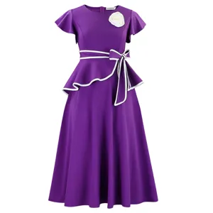 Elegant purple short sleeve dress with ruffle hem and a decorative white flower accent