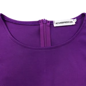Detail shot of purple slim-fit dress neckline featuring hidden zipper and label