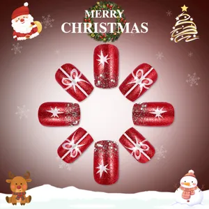 Detailed view of red glitter Christmas press-on nails with snowflakes and bows