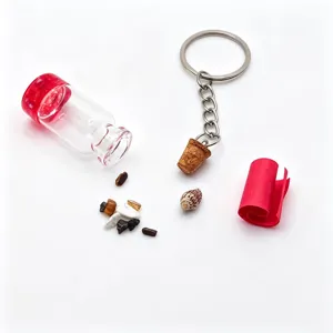 Ocean theme wishing bottle keychain with mini glass bottle shell and colorful stone charms.