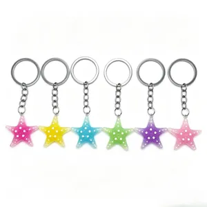 Colorful resin starfish keychain, shiny glitter bag charm and cute keyring pendant for women.