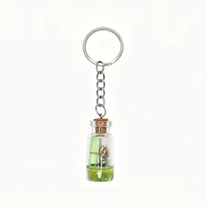 Ocean theme mermaid drift bottle keychain detailed view with glass vial and mini figurine.