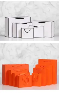 Papieren tassen set wit en oranje geschenkzakken voor retail verpackung bedrukt logo.