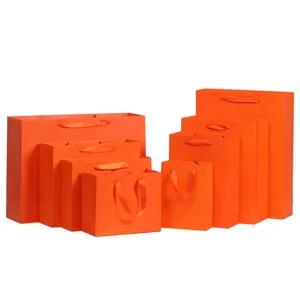 Oranje papier cadeau tassen set shopping draagtassen met lint handgrepen voor kledingwinkel verpakking