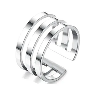 Minimalist multi-band silver open ring detail view, stylish fashion jewelry accessory.