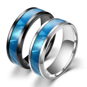 Stainless steel couple rings featuring a stylish blue inlay design for fashion jewelry wear.