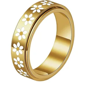 Anello antiansia girevole in acciaio al titanio dorato con margherite bianche vista dettagliata