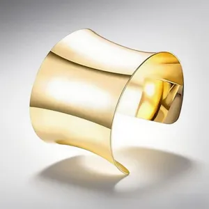 Wide gold metal cuff bracelet stylish open bangle minimalist modern jewelry accessory chic gift