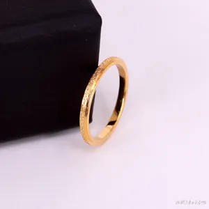 Minimalist 2mm thin titanium steel matte gold ring for couples, elegant daily wear jewelry.