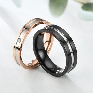 Modische Titanstahl Partnerringe mit funkelnden Strasssteinen, trendiger Schmuck für Paare.