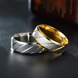 Stainless steel couple rings featuring stylish diagonal cut striped design in two-tone finish.