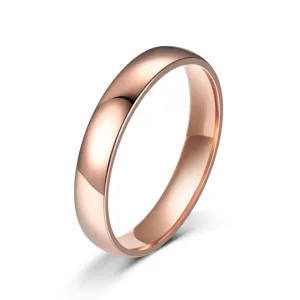 Detailed view of smooth rose gold steel ring with comfortable rounded band profile.