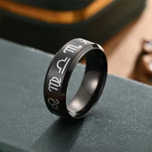 Stainless steel zodiac ring with engraved astrological signs, stylish couple jewelry piece.