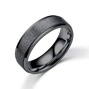 Black titanium steel ring closeup, matte frosted finish with polished beveled edge details.