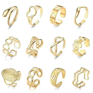 Vue détaillée de bagues ouvertes réglables tendance, bijoux fantaisie en acier doré.