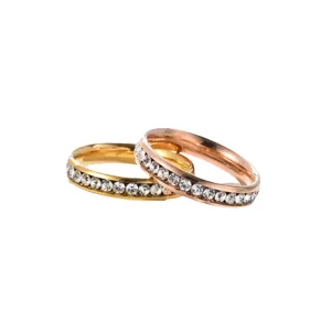 Stainless steel rhinestone couple rings set, gleaming crystal channel-set fashion jewelry.