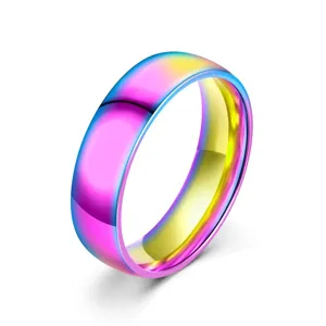Detailed close-up of a rainbow titanium steel ring, 6mm wide curved plain band design.