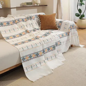 Jeté de canapé nordique en nid d'abeille avec motifs géométriques et franges élégantes
