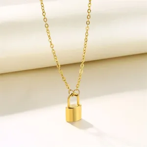 Minimalistische goldene Vorhängeschloss-Halskette, filigrane Kette, schicker Schmuck.