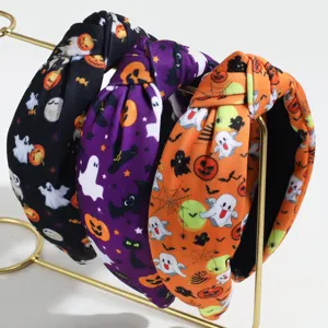 Halloween knotted headband set featuring spooky ghost and pumpkin prints for women and girls.