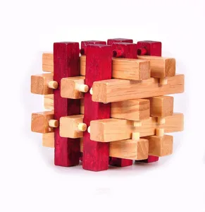 Wooden interlocking puzzle detail view, traditional educational brain teaser toy with red and natural wood bars.