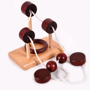 Wooden brain teaser puzzle adult intelligence unlock string game interlocking toy for desktop.