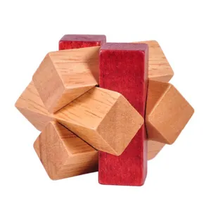 Wooden interlocking puzzle detail view, traditional cognitive brain teaser toy with red wood.