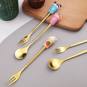 Conjunto creativo de cuchara y tenedor de dibujos animados de acero inoxidable para postres infantiles.