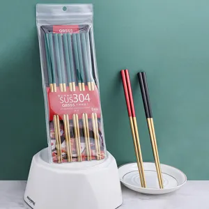 Stainless steel chopsticks 5-pair set with gold tips, durable 304 metal kitchen flatware.