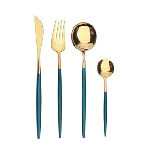 Elegant stainless steel flatware set featuring a gold mirror finish and stylish teal handles.
