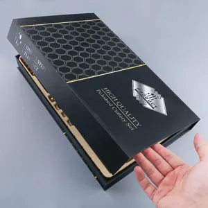 Edelstahl Besteck Set in schwarzer Luxus Geschenkschachtel mit goldenem Besteck, Hauptbild.