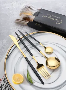 Edelstahl Besteckset in Schwarz und Gold, luxuriöses Steakmesser, Gabel und Löffel Besteck.