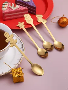 Set di cucchiai natalizi in acciaio inossidabile dorato con simpatico design di pan di zenzero.