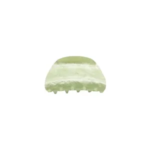 Minimalist light green semi-translucent acrylic hair claw clip with marble texture