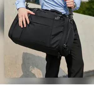 Detail view of large capacity waterproof travel duffel bag with shoulder strap for outdoor trips.