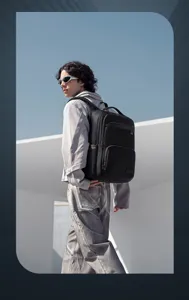 Detail view of the black multifunctional business laptop backpack for men travel commute.