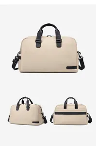 Waterproof nylon business travel duffel bag with large capacity, multiple compartments and handles.