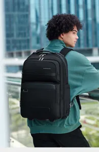 Waterproof business rolling backpack for travel, versatile dual-use travel laptop bag with wheels.