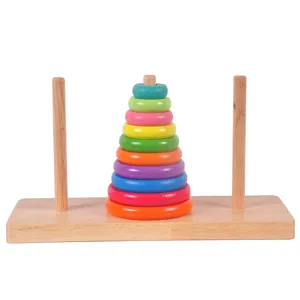 Wooden tower of hanoi puzzle detail shot, multi-color stacking rings on wooden peg base.